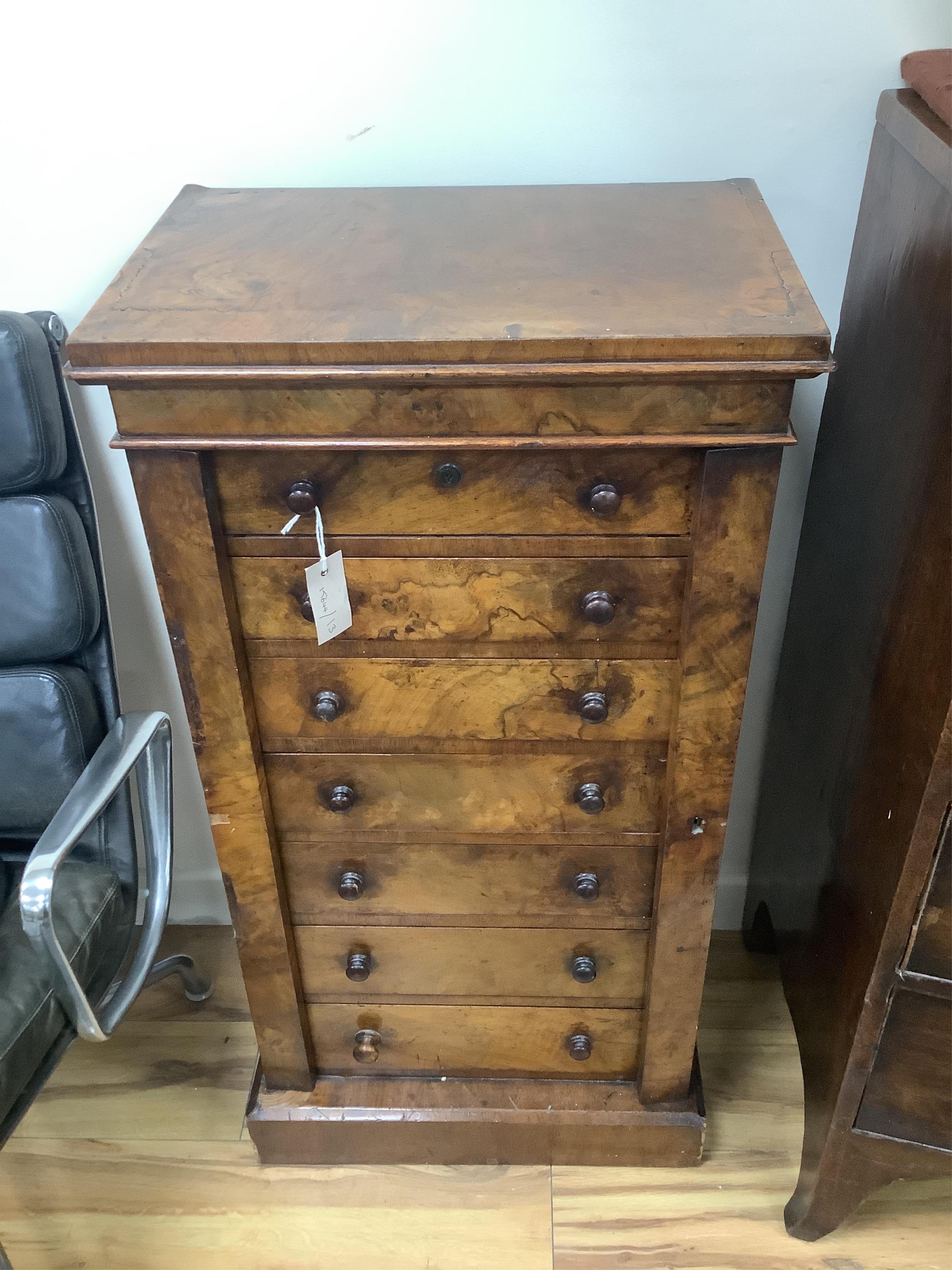 A Victorian figured walnut Wellington chest, width 49cm, depth 33cm, height 98cm. Condition - poor to fair